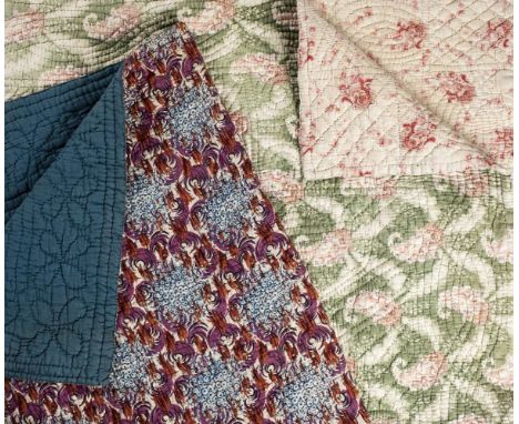 *Quilt. A Welsh quilt, circa 1930s,  reversible quilt of printed cotton with pink boteh motif on a green and white ground, pr