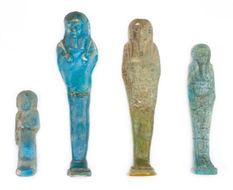 *Ancient Egypt. Ptolemaic, pale green faience Shabto of Sma-tawy-tef-nakht,  the mummiform figure modelled with tripartite wi
