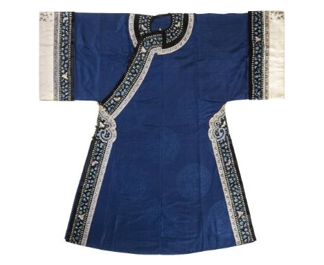 *Chinese robe. An embroidered silk robe, early 20th century,  blue silk robe with matching lining, figured with large circula