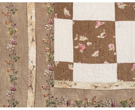 *Quilt. A patchwork quilted coverlet, English, early 19th century,  large hand-stitched bedcover, backed with white cotton, c