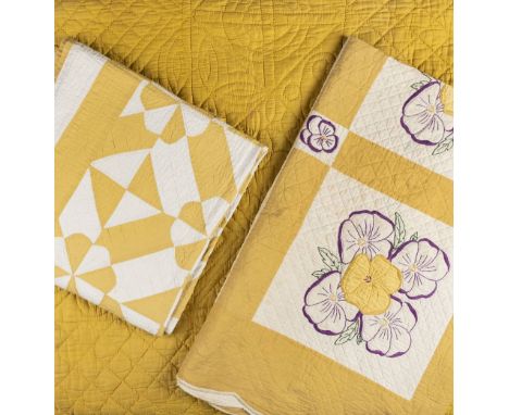*Quilt. A gold quilt, French, early 20th century,  gold cotton sateen (some minor marks and one small hole), backed in cream 