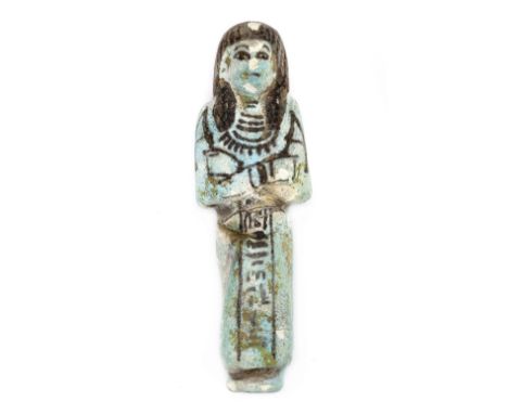 *Ancient Egypt. 19/20th Dynasty, light blue faience female worker Shabti of Ast (Isis),  the mummiform figure modelled wearin