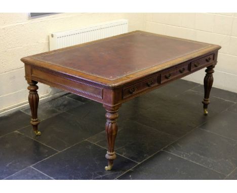 *Partners Table. A Victorian mahogany partners writing table,  with red tooled leather top above 3 drawers to each side each 