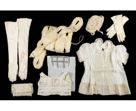 *Clothing. A collection of vintage clothing and accessories, late 19th-mid 20th century,  mainly infant's clothes, including 