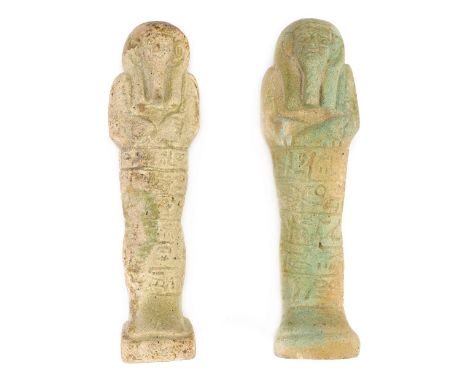 *Ancient Egypt. Late Ptolemaic(?), pale green faience Shabti of Ir-en-di-khonsu,  the mummiform figure modelled tripartite wi