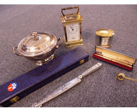 *Carriage Clock. A modern brass carriage clock,  the white dial signed L' Epee, black roman numerals and subsidiary seconds d