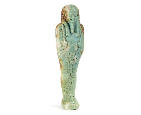 *Ancient Egypt. 30th Dynasty,  turquoise faience mummiform Shabti probably the priest Semataui-tefnakht, modelled wearing str