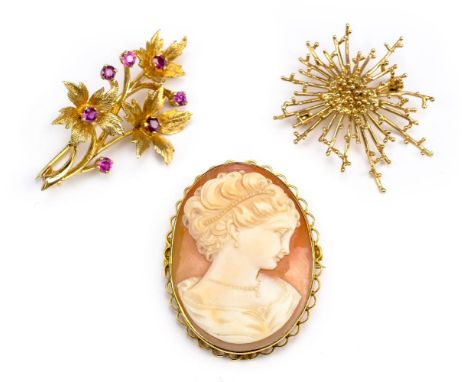 *Mixed Jewellery. A 9ct gold floral brooch,  set with 7 rubies, stamped '375, 6g gross, together with a 1970s 9ct gold abstra