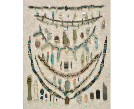 *Ancient Egypt. An extensive collection of Egyptian antiquities,  including 7 faience necklaces and pendants, amulets includi