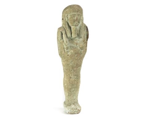 *Ancient Egypt. Pale green faience Shabti,  unidentified, mummiform figure, wearing striated tripartite wig, long curving pla