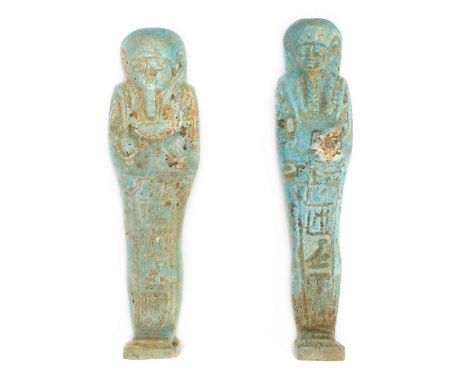 *Ancient Egypt. Ptolemaic, pale blue faience Shabti of Ta-Amun (whose mother was Weret-sehi?), the mummiform figure modelled 