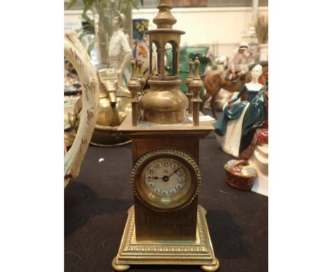 Brass mechanical clock with ceramic dial and bevelled glass 