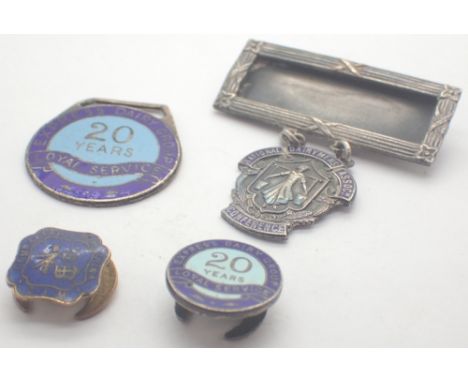 Express Dairies hallmarked silver badges and an enamel pin badge