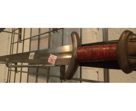 Heavy metal reproduction sword and leather scabbard vendor states used in Robin Hood film shot in Frodsham blade L: 82 cm CON