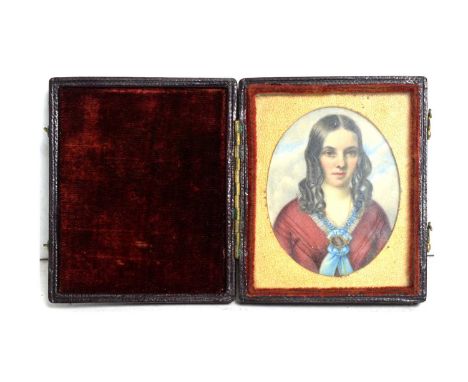 19th Century British SchoolPortrait of a young lady in a crimson dress, her hair worn in loose ringlets, circa 1850,tempera o