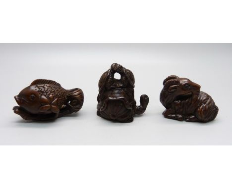 Three carved netsuke, fish, deer and turtles 