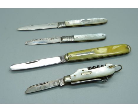 Two Georgian silver and mother of pearl fruit knives, a small utility knife and one other knife 