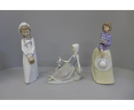A Lladro figure and two Nao figures 