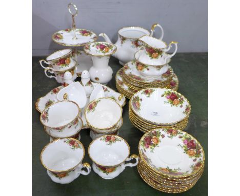 A collection of Royal Albert Old Country Roses china including a two-tier cake stand and Royal Albert celebration 1970 teapot