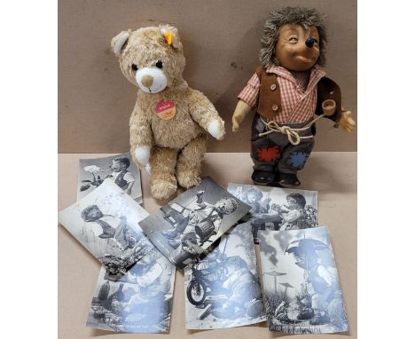 A Steiff Teddy bear and a Steiff Mecki doll with accompanying postcards 