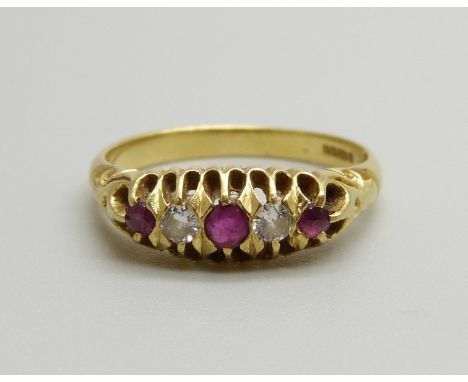 An 18ct gold, two diamond and three ruby ring, 3.3g, M 