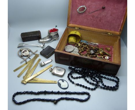 Assorted items including a novelty shoe pin cushion, snuff box, vesta case, a folding brass ruler, cigar cutter, beads, stamp