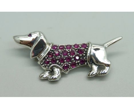 A silver and ruby Dachschund dog brooch 