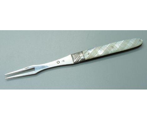 A Georgian silver and mother of pearl olive fork 
