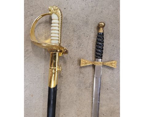 Two swords, one blade marked Wilkinson, possibly Masonic and one other sword 