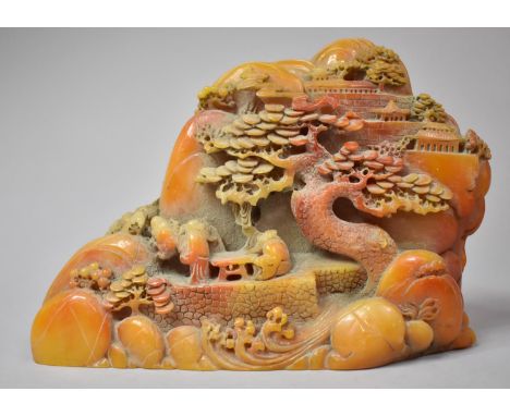 A Carved Composite Item, in the Form of Boulder with Village Scene Depicting Figures, Houses and Blossoming Tree, 13cm high 