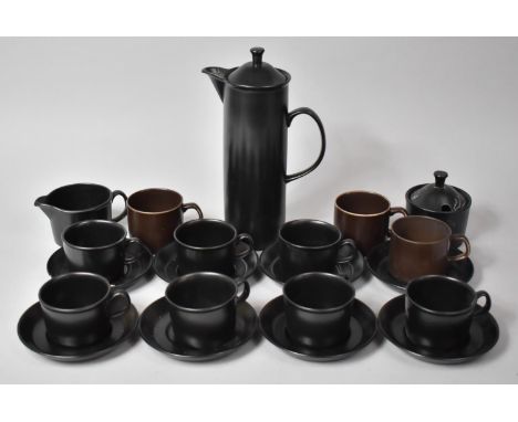 A Black Glazed Wedgwood of Etruria and Barlaston Coffee Set comprising Eight Saucers, Coffee Cans, Lidded Sugar Bowl together