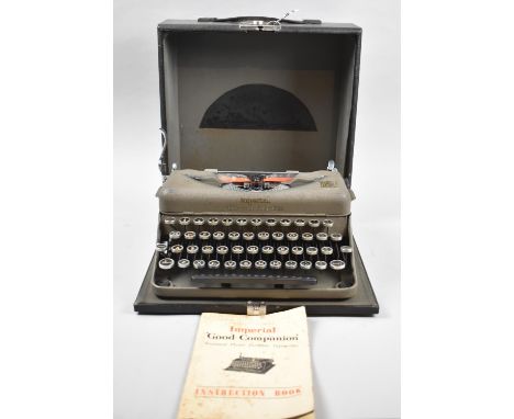 A Vintage Imperial Good Companion Standard Model Portable Typewriter with Instruction Book 