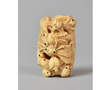 A Carved Bone Netsuke in the Form of Entwined Bugs with Stained Black eyes, Signed, 5cm Long 