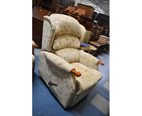 A Modern Reclining Tapestry Upholstered Armchair 