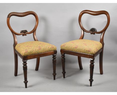 A Pair of Late Victorian Mahogany Framed Balloon Backed Side Chairs with Tapestry Upholstered Seats 