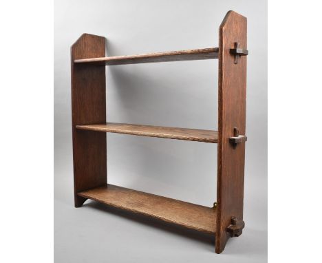 An Edwardian Oak Freestanding Wall Hanging Three Shelf Unit, 51cm wide and 56cm high 