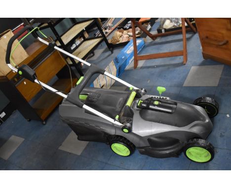 A Gtech Rotary Lawn Mower and a Strimmer 