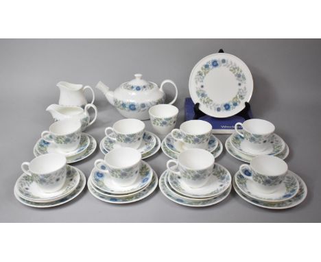 A Wedgwood Clementine Pattern Tea Set to comprise Eight Cups. Eleven Saucers, Seven Side Plates, Serving Plate, Tea Pot, Milk