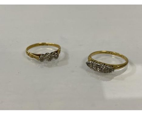 Two 18ct gold diamond rings, one with navette shaped setting with multiple chip diamonds, one with centre chip diamond and si
