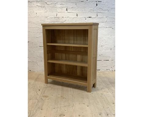 A contemporary light oak veneers open bookcase with two adjustable shelves, H110cm, W95cm, D31cm