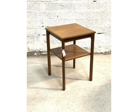 A Vintage mid century teak two tier table, the moulded top raised on square supports united by an undertier, H60cm, W40cm, D4