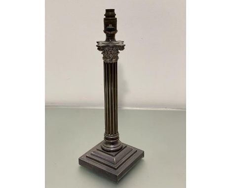 An Edwardian Epns Corinthian column oil lamp base on stepped square base, converted to electricity (h.43cm base: 15cm x 15cm)