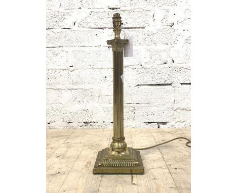 A brass Corinthian style table light, first half of the 20th century, H56cm