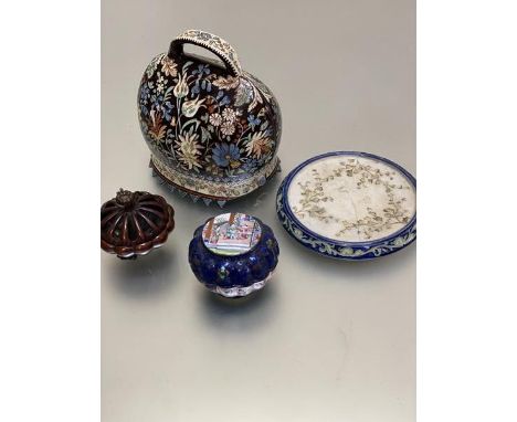 A MacIntyre china teapot stand with central floral spray, with hairline crack, with blue and leaf moulded border, stamped ver