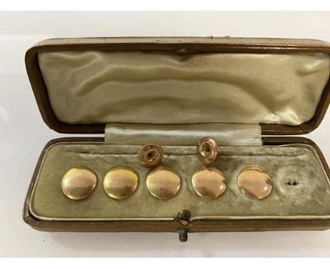 A set of five Chester hallmarked 9ct buttons, makers mark AW (0.8cm) and two studs, both marked 9ct, with original box, one b