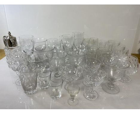 A quantity of glasses including some crystal, one with Wedgwood label, including wine glasses, brandy goblets, sorbet glasses