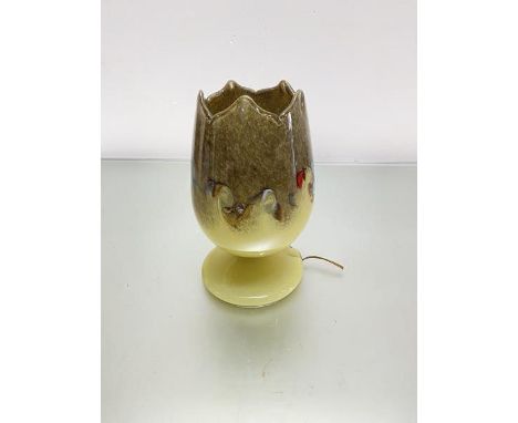 A Monart glass tulip shaped lamp with pyrites, scrolling coloured glass etc., on circular moulded base (h.25cm x base: 14cm)