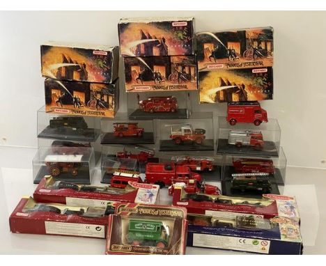 A collection of model fire services vehicles, including Matchbox Fire Engine series, many in display cases, also model trains