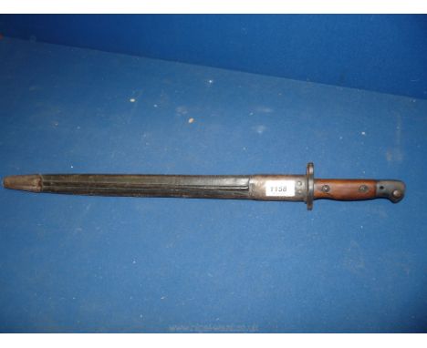 A 1907 (with over stamped 1917) British Bayonet in leather scabbard by Wilkinsons.