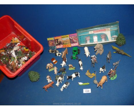 A quantity of plastic farm animals, trees, Indians and card games including Rummy, Snap and a Esso service centre.